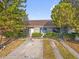 Inviting single-story home with simple landscaping, clearly defined driveway, and a pleasant front entrance at 2504 London Bridge Ct, Orlando, FL 32837