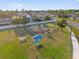 Aerial view of a community playground with various play structures and picnic areas at 2504 London Bridge Ct, Orlando, FL 32837