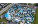 Spectacular aerial view of the waterpark featuring a variety of slides, pools, and recreational areas at 2988 Salted Rim Rd, Kissimmee, FL 34747