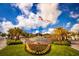 Margaritaville Resort entrance featuring lush landscaping, flags, and a welcoming ambiance for a relaxing getaway at 2988 Salted Rim Rd, Kissimmee, FL 34747