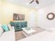 Relaxing living room showcasing stylish decor, modern media center, and bright open space at 2988 Salted Rim Rd, Kissimmee, FL 34747