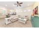 Inviting living area with open layout, perfect for gatherings and entertainment, and dining space at 2988 Salted Rim Rd, Kissimmee, FL 34747