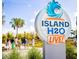 A vibrant Island H2O Live! sign invites visitors, surrounded by lush greenery and the promise of water park fun at 2988 Salted Rim Rd, Kissimmee, FL 34747