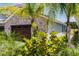 Garage exterior shows landscaping and hardscape at 3078 Isles Way, New Smyrna Beach, FL 32168