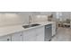 Kitchen sink features stainless steel appliances, granite countertops, and tile backsplash at 3078 Isles Way, New Smyrna Beach, FL 32168