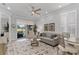 Spacious living room with neutral tones, ample seating and backyard access at 3078 Isles Way, New Smyrna Beach, FL 32168