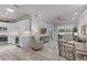 Open living space with kitchen, dining and backyard views at 3078 Isles Way, New Smyrna Beach, FL 32168