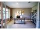 Bright home office featuring a work desk, custom shelves and lots of natural light at 3242 Viceroy Ct, Poinciana, FL 34759