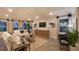 Bright living room with hardwood floors, comfortable seating, and large windows at 3242 Viceroy Ct, Poinciana, FL 34759