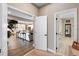 Inviting hallway showcasing an open floor plan with views of the kitchen and living area, enhancing the home's flow at 3332 Lone Cypress Pt, Oviedo, FL 32765
