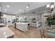 Bright, open kitchen connected to the living room features a large island and modern appliances at 3332 Lone Cypress Pt, Oviedo, FL 32765