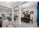 Spacious open concept design showing the kitchen, living room and dining room at 3332 Lone Cypress Pt, Oviedo, FL 32765