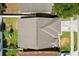 Aerial view of a backyard with a playset; the roof is in the foreground at 342 Hanging Moss Cir, Lake Mary, FL 32746