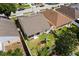 Aerial view of the backyard with a playset, and view of the house's screened in porch at 342 Hanging Moss Cir, Lake Mary, FL 32746