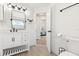 Bright bathroom featuring a vanity, mirror, and toilet at 342 Hanging Moss Cir, Lake Mary, FL 32746