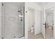 Modern bathroom features glass shower, toilet room, and access to bedroom at 342 Hanging Moss Cir, Lake Mary, FL 32746