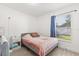 Bright bedroom featuring tile floors, a full-sized bed and natural light at 342 Hanging Moss Cir, Lake Mary, FL 32746