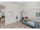 Bright bedroom featuring tile floors, a -sized bed, and white walls at 342 Hanging Moss Cir, Lake Mary, FL 32746