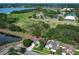 Aerial view highlighting the home's location near a lake and recreational park at 3562 Gatlin Pl, Orlando, FL 32812