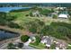 Aerial view highlighting the home's location near a lake and recreational park at 3562 Gatlin Pl, Orlando, FL 32812