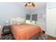 Comfortable bedroom with a ceiling fan, neutral paint, and lovely natural light at 3562 Gatlin Pl, Orlando, FL 32812