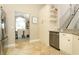 A modern kitchen featuring granite countertops and stainless steel appliances at 3562 Gatlin Pl, Orlando, FL 32812