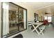 Covered patio with outdoor seating offering a view of the home's interior at 3562 Gatlin Pl, Orlando, FL 32812