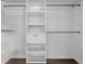 Well-organized walk-in closet with custom shelving and ample storage space at 3605 Pershing Ave, Orlando, FL 32812
