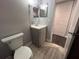 Updated bathroom featuring a modern vanity with updated fixtures and tile flooring at 3807 Atrium Dr, Orlando, FL 32822