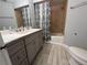 Bathroom featuring nice vanity with marble countertop and modern fixtures at 3807 Atrium Dr, Orlando, FL 32822