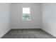 Neutral carpeted bedroom featuring a bright window at 4830 Prairie Preserve Run, St Cloud, FL 34772
