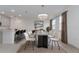 Elegant dining room with contemporary chandelier, stylish table setting, and view to the kitchen at 4830 Prairie Preserve Run, St Cloud, FL 34772