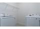 Clean laundry room with new washer and dryer at 4830 Prairie Preserve Run, St Cloud, FL 34772