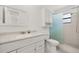 Bathroom featuring a shower with glass doors and modern vanity at 522 Boxelder Ave, Altamonte Springs, FL 32714
