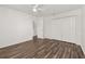 Bright bedroom features a ceiling fan and a double door closet at 522 Boxelder Ave, Altamonte Springs, FL 32714