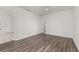 Bedroom featuring tile flooring at entrance and laminate floor in bedroom at 522 Boxelder Ave, Altamonte Springs, FL 32714