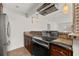 Modern kitchen featuring an oven, tile backsplash, and pendant lighting at 522 Boxelder Ave, Altamonte Springs, FL 32714
