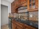 Close-up view of the kitchen sink, countertops, and wood cabinets at 522 Boxelder Ave, Altamonte Springs, FL 32714