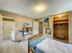 Bedroom with ensuite bathroom, closet, and neutral walls at 5811 Harcourt Ave, Orlando, FL 32839