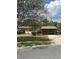 Charming single-story home featuring a well-maintained lawn and mature trees for added curb appeal at 5811 Harcourt Ave, Orlando, FL 32839