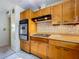 Kitchen with a gas range, butcher block countertops, and stainless steel appliances at 5811 Harcourt Ave, Orlando, FL 32839