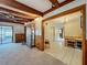Living area with hardwood accents that opens to a dining and additional rooms at 5811 Harcourt Ave, Orlando, FL 32839