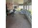 Relaxing screened-in patio with comfortable seating, perfect for enjoying the outdoors at 5811 Harcourt Ave, Orlando, FL 32839