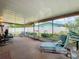 Bright sunroom with comfortable seating, perfect for relaxation and enjoying the outdoor views at 5811 Harcourt Ave, Orlando, FL 32839