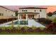 Home's exterior showcases a pristine pool, lush landscaping, and backyard at sunset at 675 Primrose Willow Way, Apopka, FL 32712