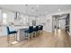 Bright, spacious kitchen with a large island, pendant lighting, stainless steel appliances, and modern finishes at 675 Primrose Willow Way, Apopka, FL 32712