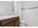 Bathroom featuring vanity, mirror, shower, tub, and toilet at 683 Campo Ln, Davenport, FL 33837