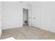 Bedroom featuring neutral carpet and open closet doors at 683 Campo Ln, Davenport, FL 33837