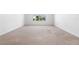 Spare bedroom featuring carpet, neutral paint, and a window at 683 Campo Ln, Davenport, FL 33837