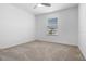 Spare bedroom featuring carpet, neutral paint, and a ceiling fan at 683 Campo Ln, Davenport, FL 33837